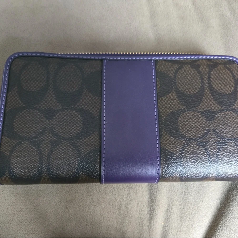 Coach Purple and Dark Brown
Signature PVC Leather Accordian
Zip Wallet - Picture 4 of 5